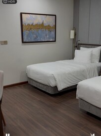 Separate bedroom area with desk , double wardrobe with lights , en suite shower room / toilet
Tv in bedroom