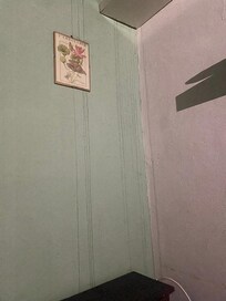 Water pouring down wall in the middle of the night