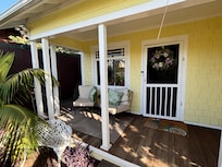 Gorgeous porch for relaxing with a little pond and fountain