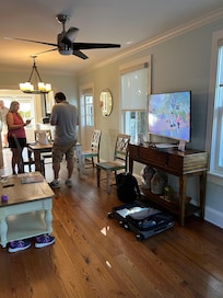 A shot of the dining room and kitchen.