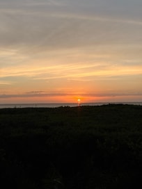 Sunrise view from screened in porch