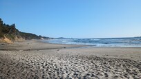 The beach below the house