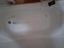 Headboard on bed scratched by some animal?