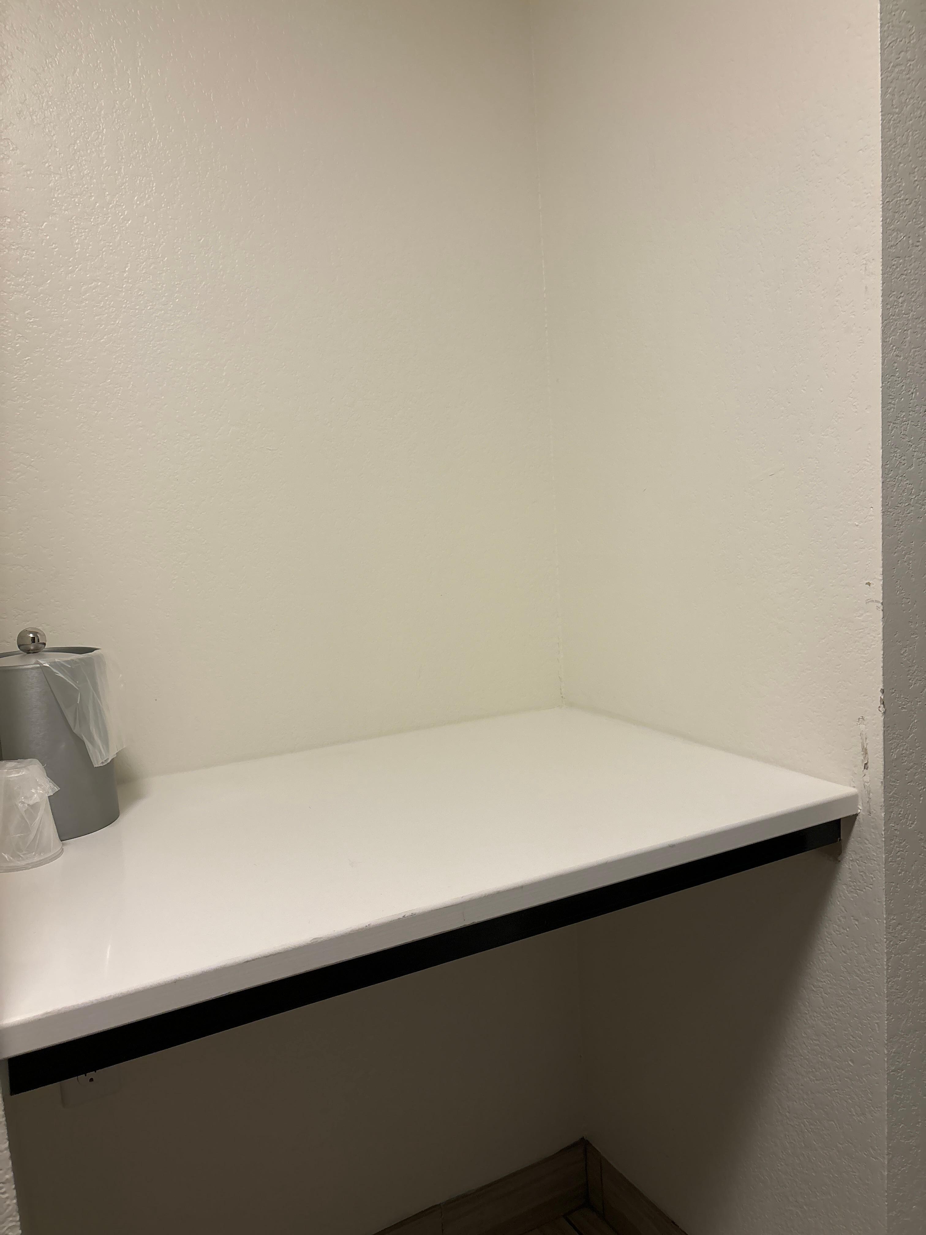 Where the microwave should be. Was told the rooms were done