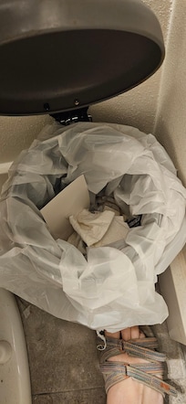 Trash in trashcan downstairs left from previous renter.