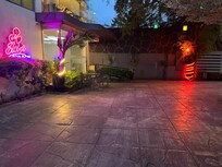 Bottom end of hotel by the pool