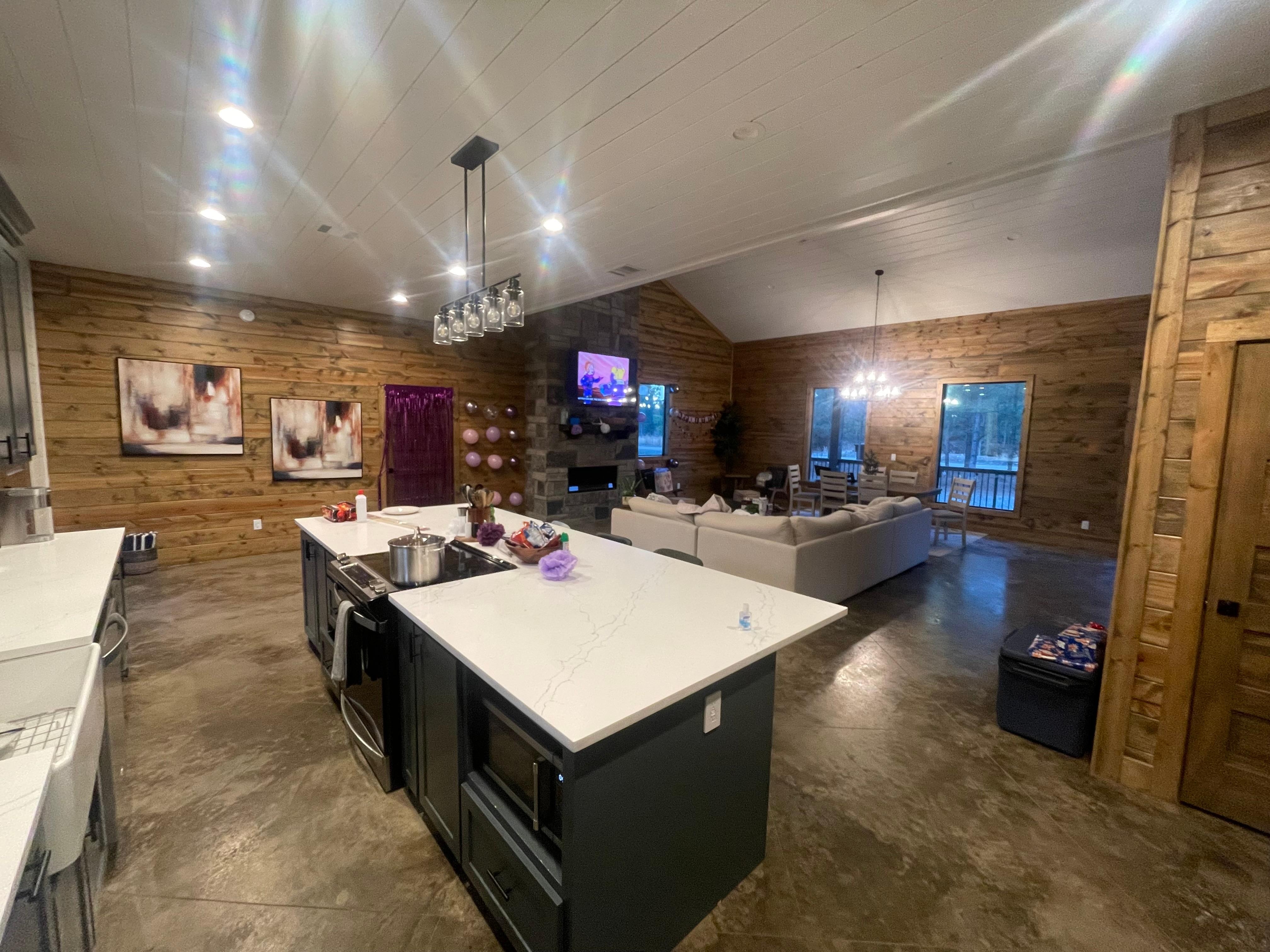 The kitchen was lovely and had a huge island with multiple bar stools. We loved preparing meals and eating here. 