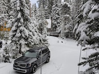 View of the street where skiers speed by throughout the day.
