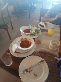 Very small table for 2 and no waitress to assist with the plates.