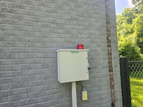 Flashing light on the outside requiring a visit by Vicksburg Sewer Company