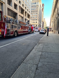 Outside hotel watching parade