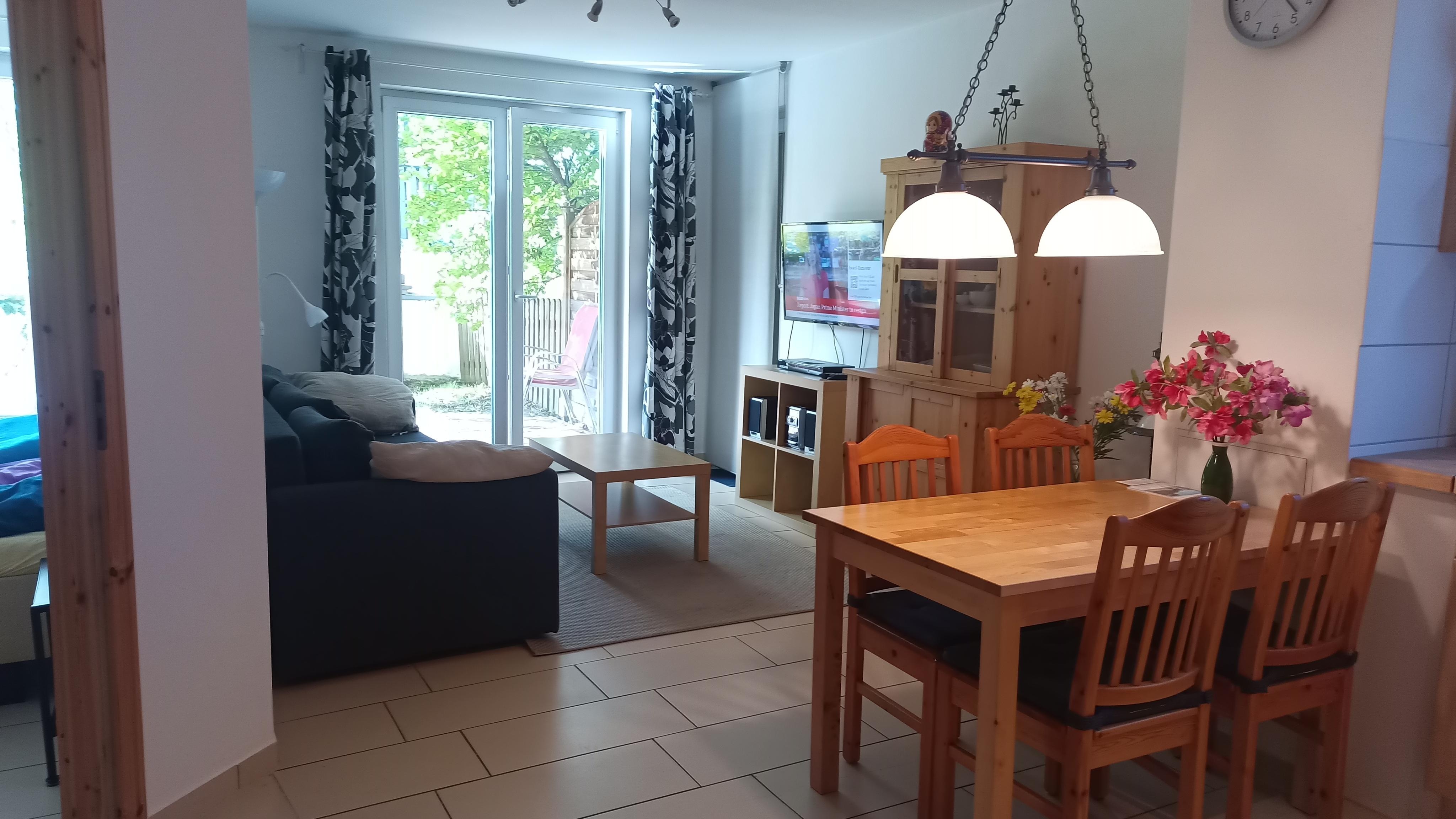 Living room as is today, one overhanging tree can be seen