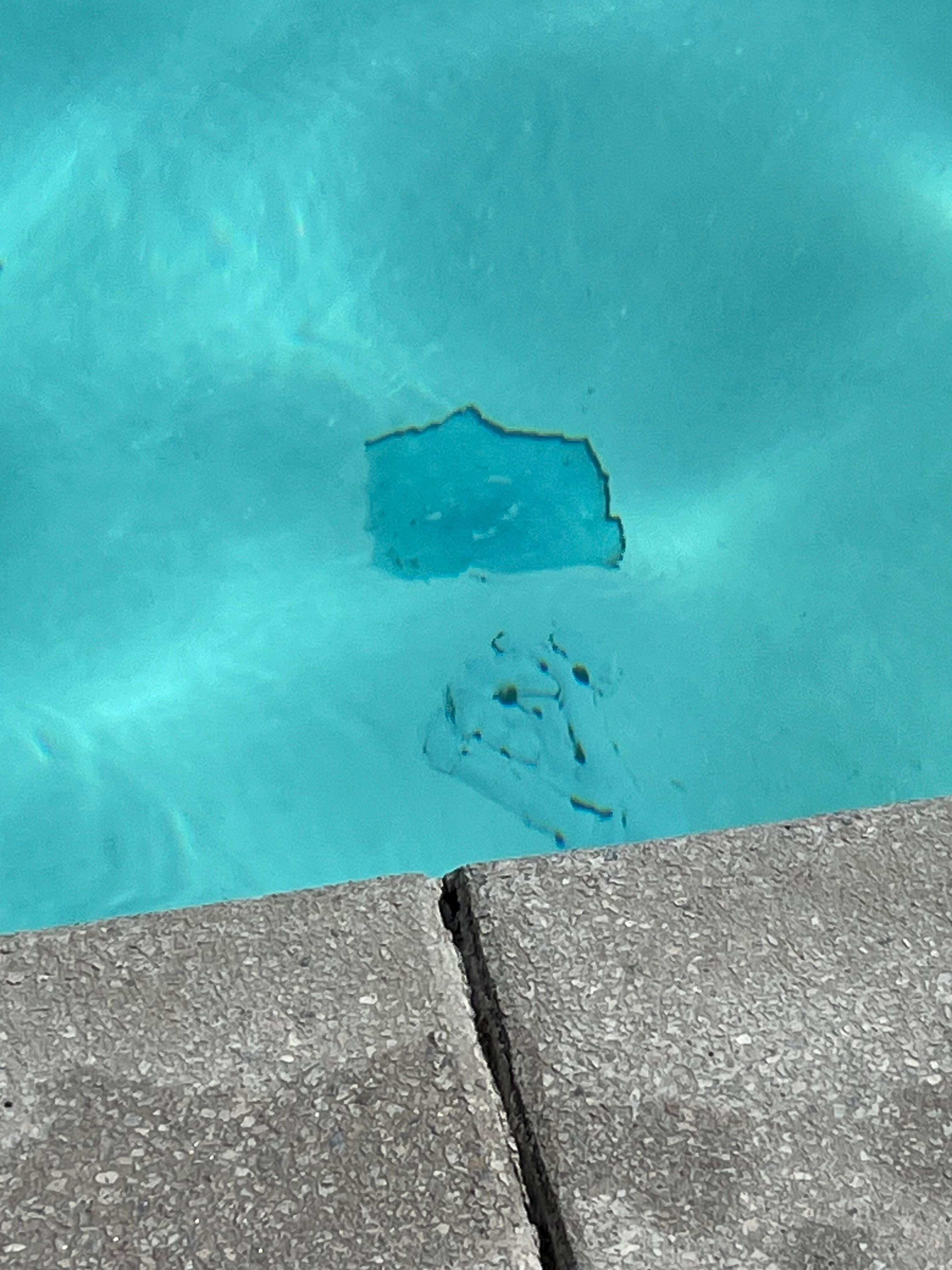 Pool plaster in need of attention. We cut our feet on it.