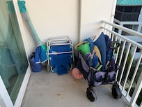 Sand toys, wagon and chair to use.