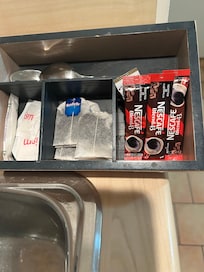 This was pathetic two odd sized spoons and two glass coffee mugs.