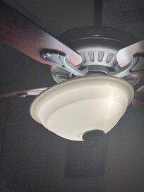 Glass shade hanging in one of bedrooms
