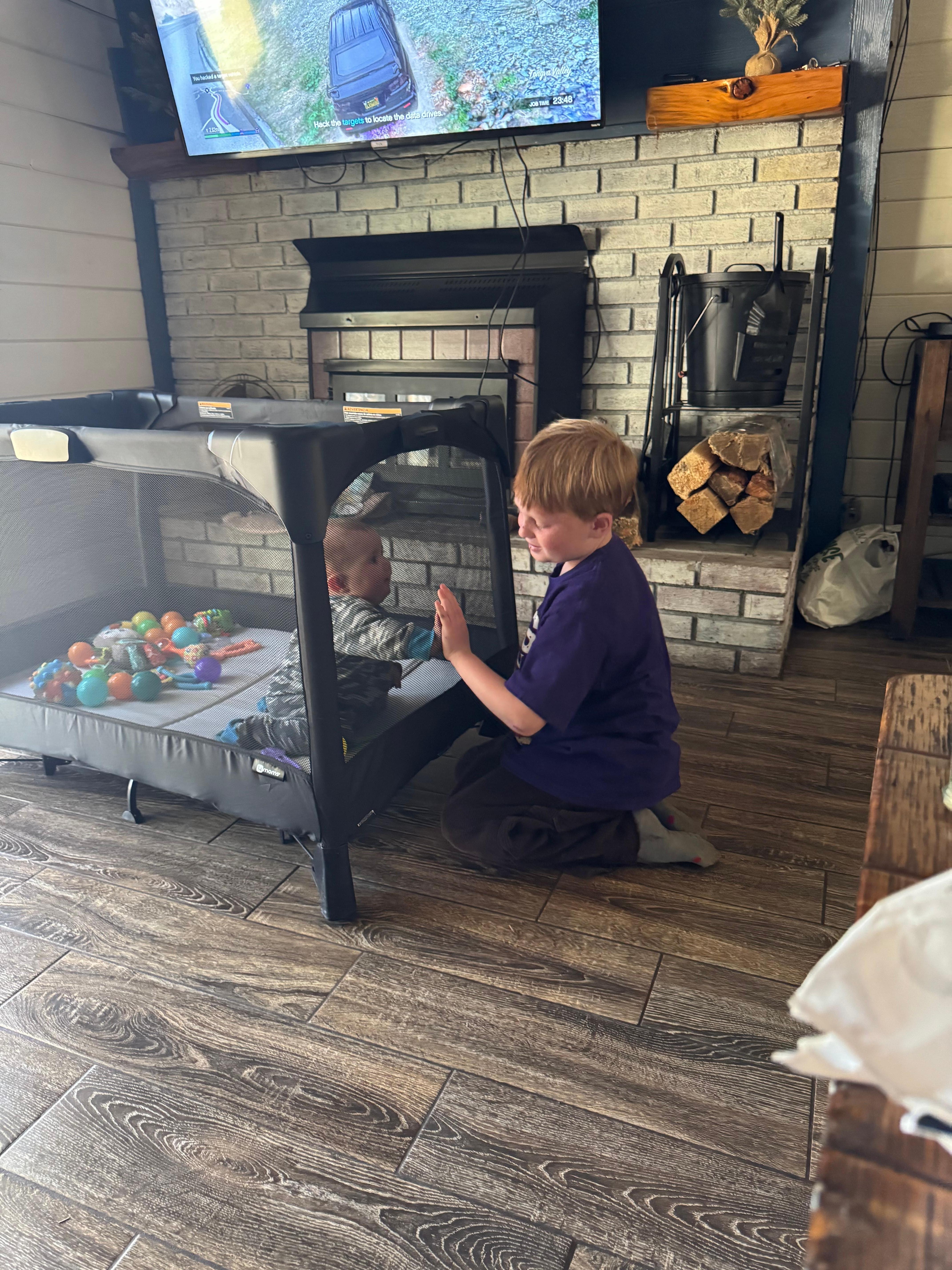 My grandson hanging out with his uncle. 