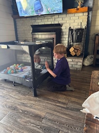 My grandson hanging out with his uncle.
