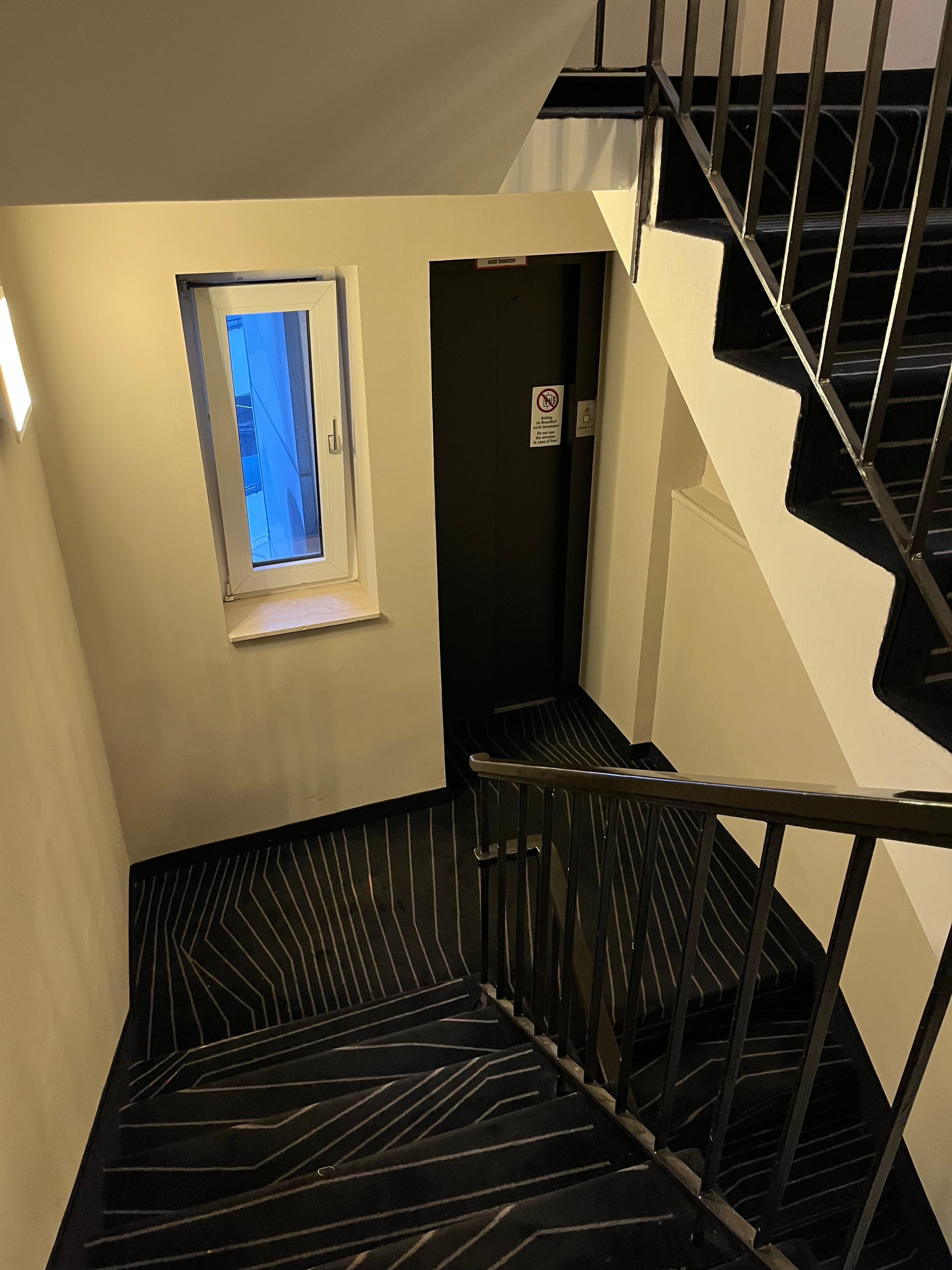 This is the top (4th) floor exit from the elevator. My room was up another flight of stairs with no signage. I have a minor disability.