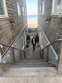 A flight of stairs down to the front door.