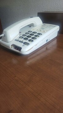 Phone had missing parts and something smeared into the cracks ewww