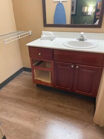 No door on the vanity and if you zoom in on the floor in the corner, there is something on the floor that I wasn't going to touch.