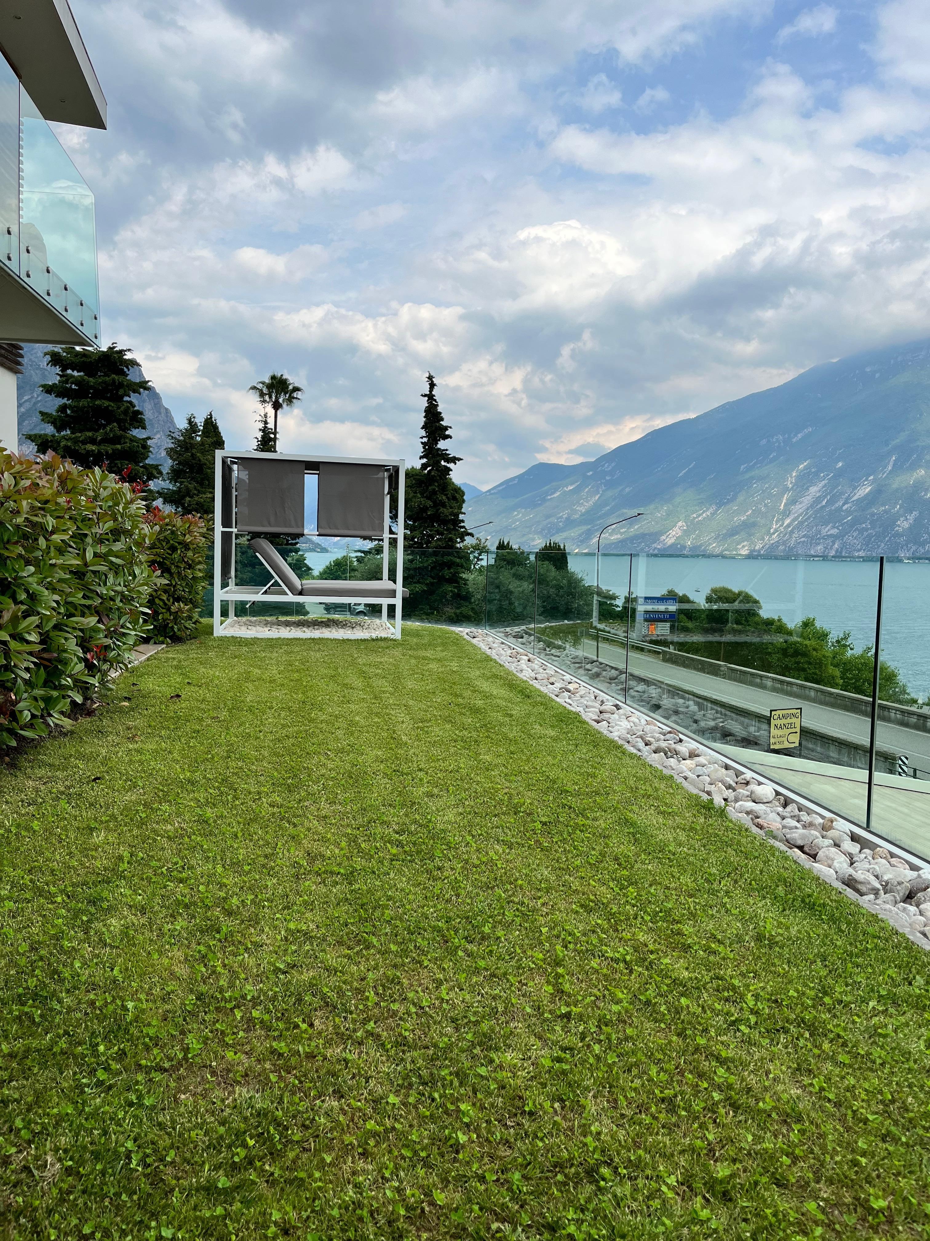 Day bed on the terrace of our room with uninterrupted lake views