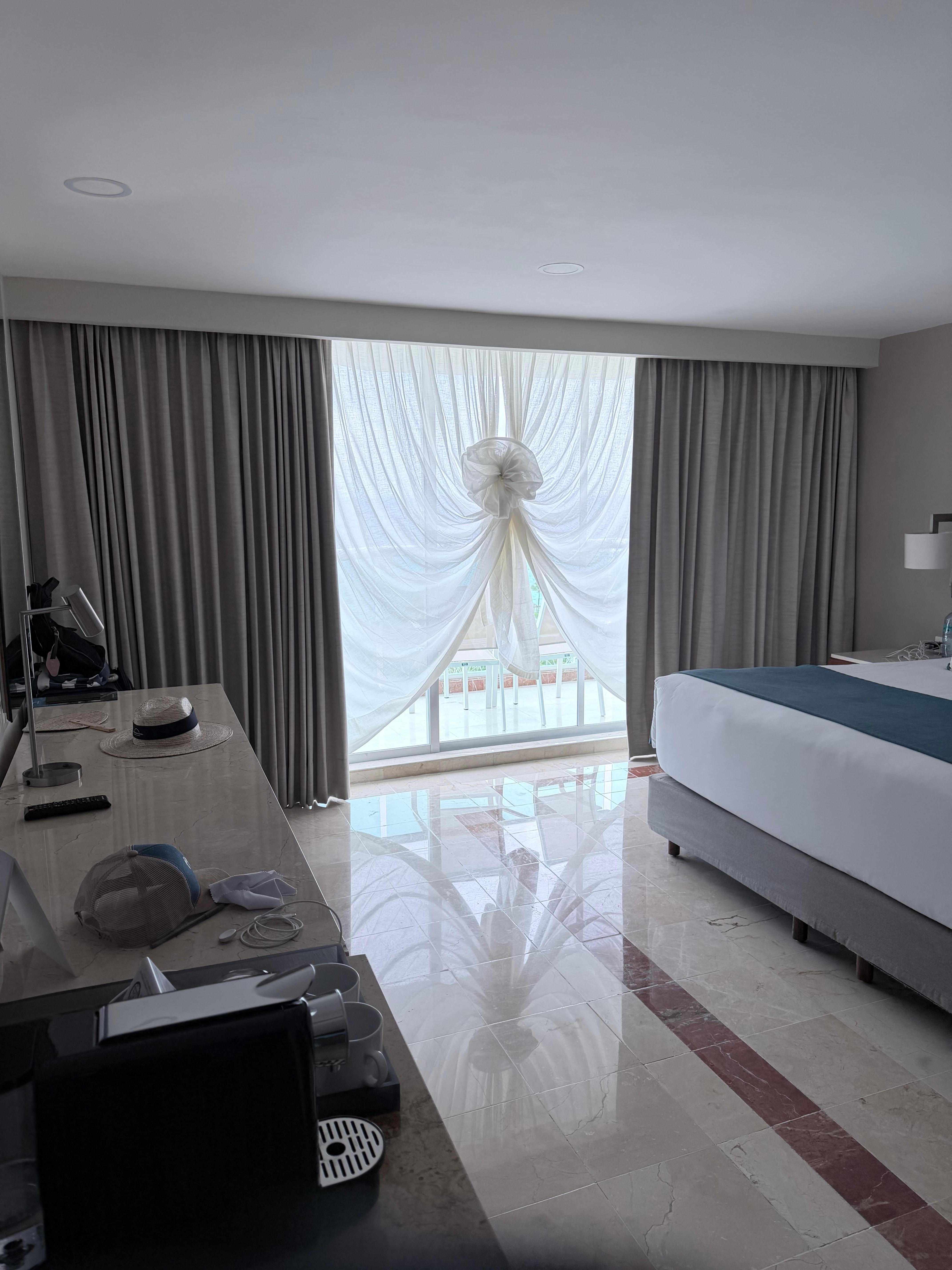 View of our room & design on curtain housekeeper did that day.