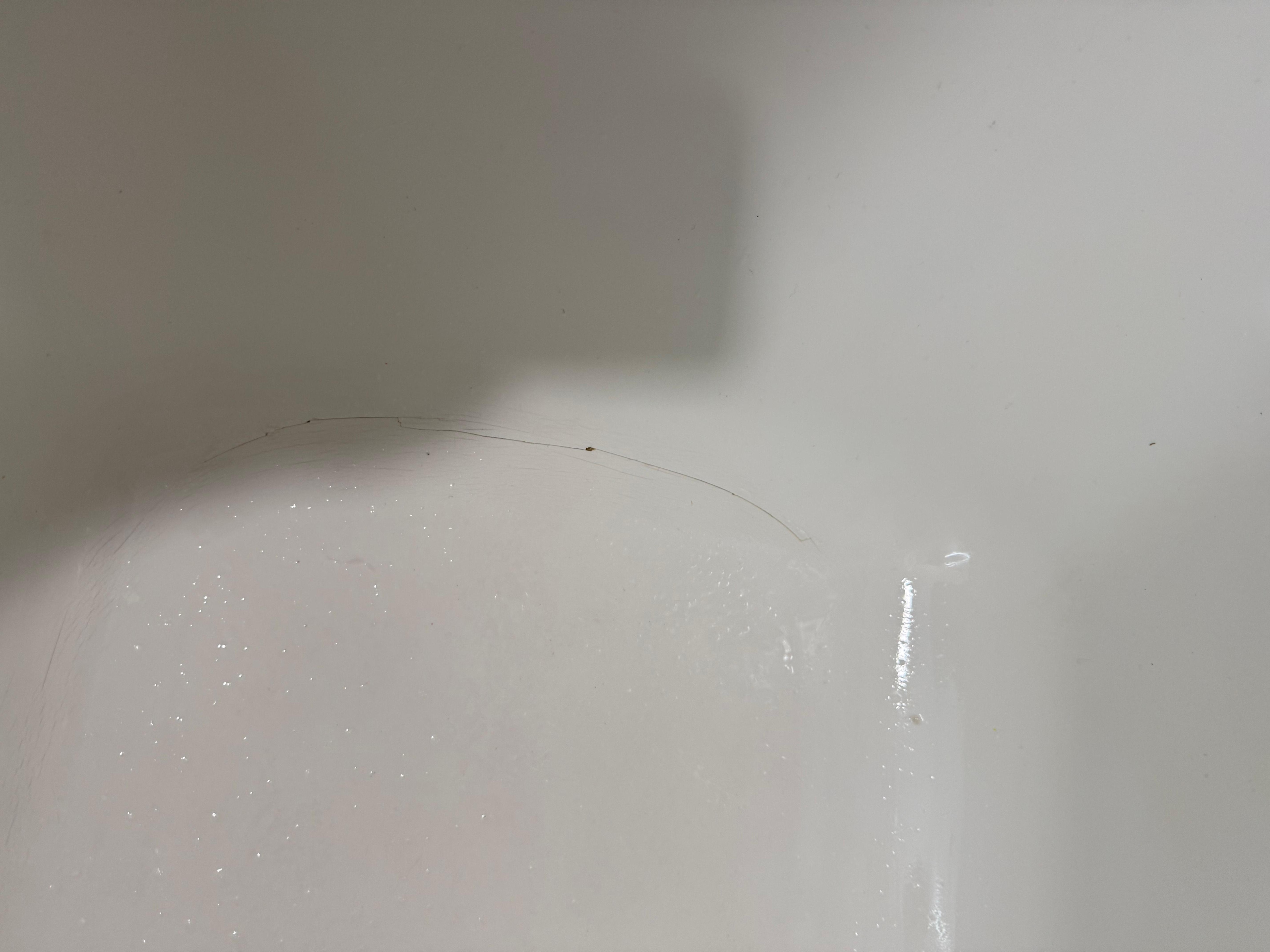 Crack on tub. Water is leaking from it.