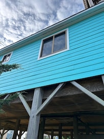 Broken blinds with the broken pieces in side and outside