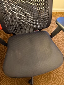 Water stain? Drink stain?? God I hope not urine! Hard as a rock chair.