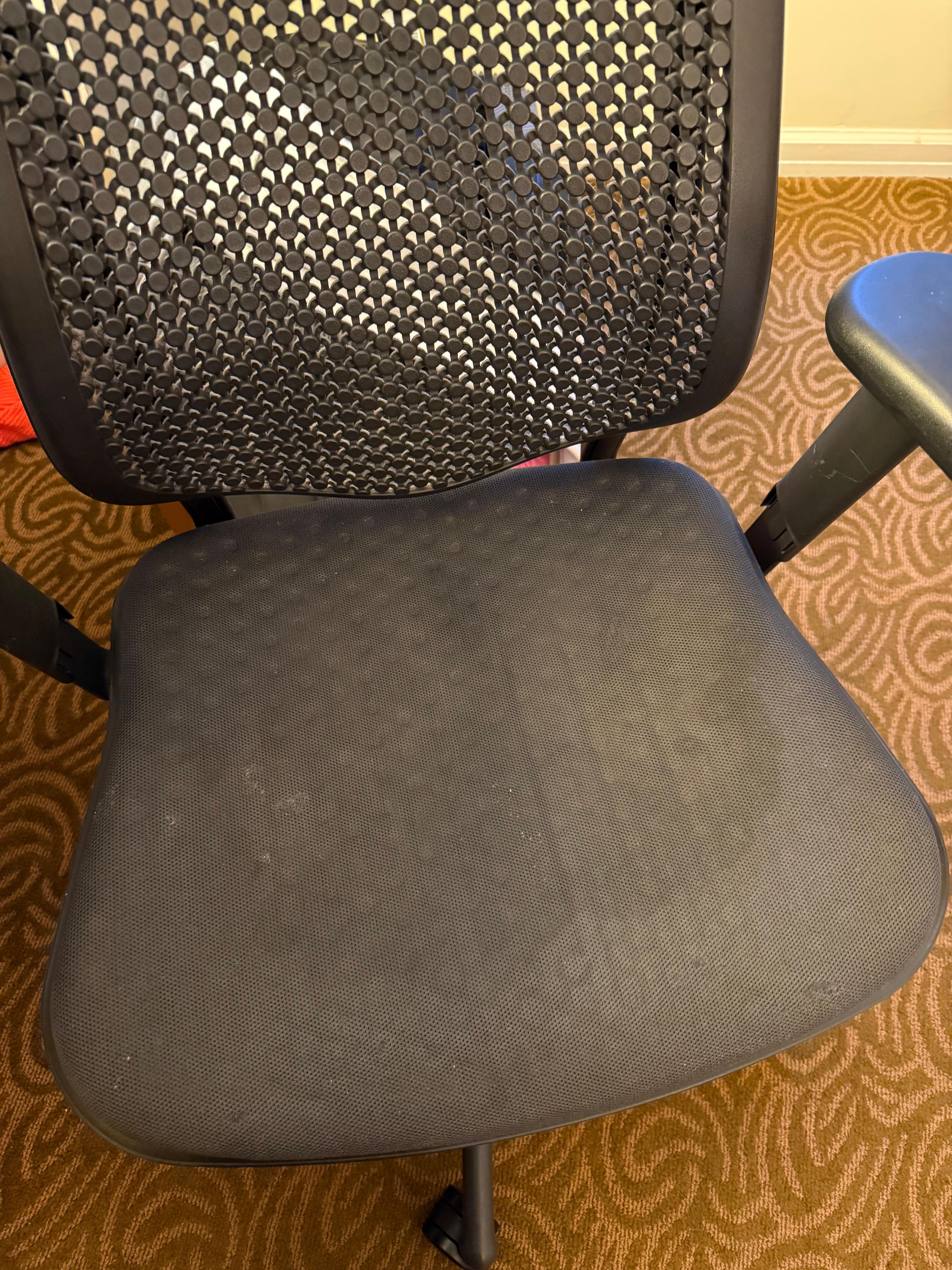 Water stain? Drink stain?? God I hope not urine! Hard as a rock chair.