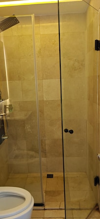 bathroom door opened out, difficult to manage water from coming out. there was always water outside as the seal is not good.