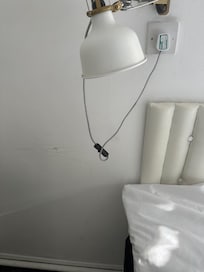 High risk to my daughter who’s 3 as this is right by the bed side and could easily get caught around her neck.