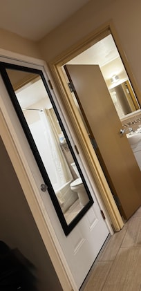 This is the door to the utility room that takes up all the space in the room