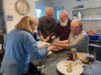 Stuffing shells for dinner in the kitchen