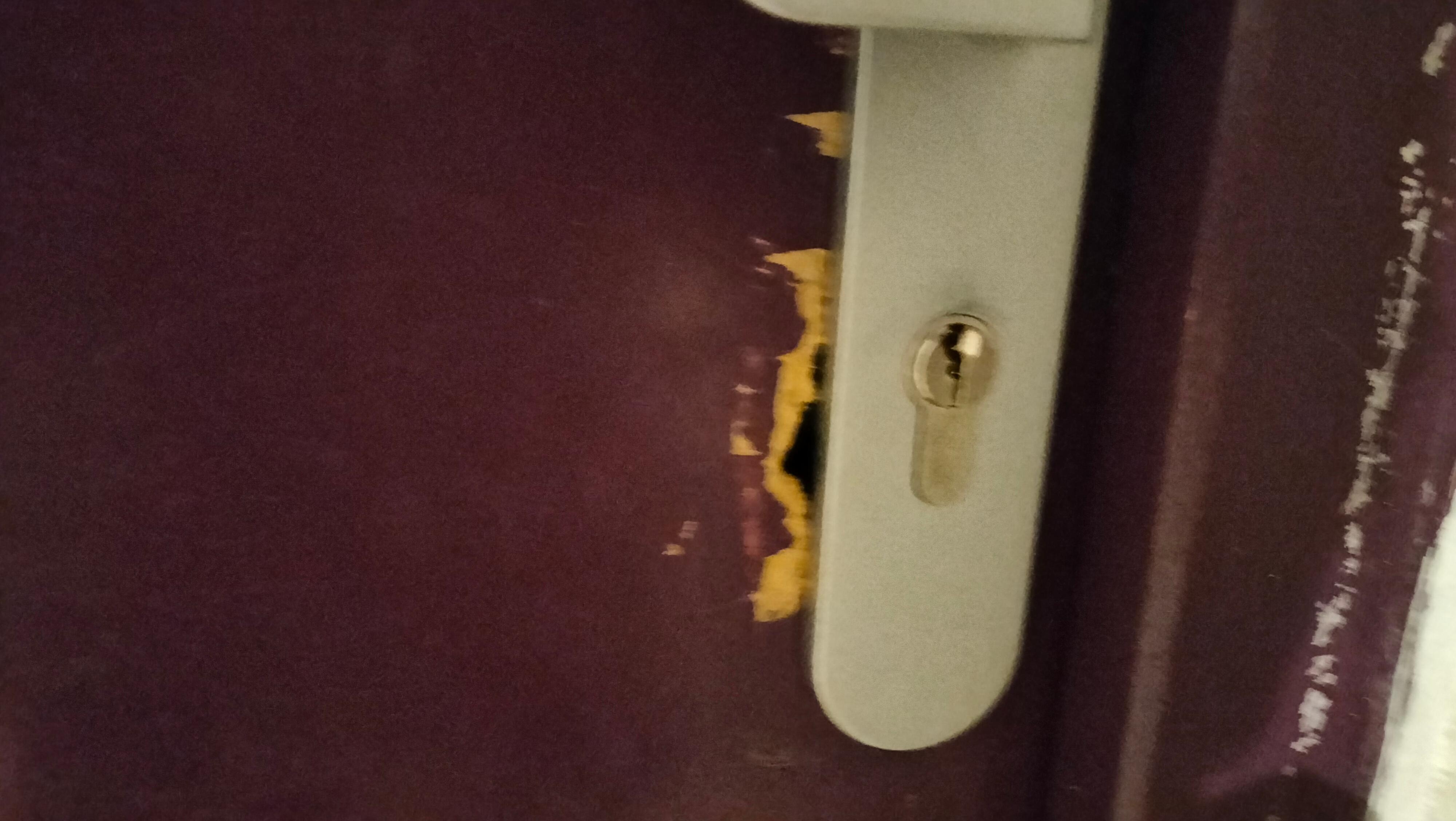 The building looks run-down, tired, and in need of repairs.