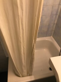 Shower curtain in the first room