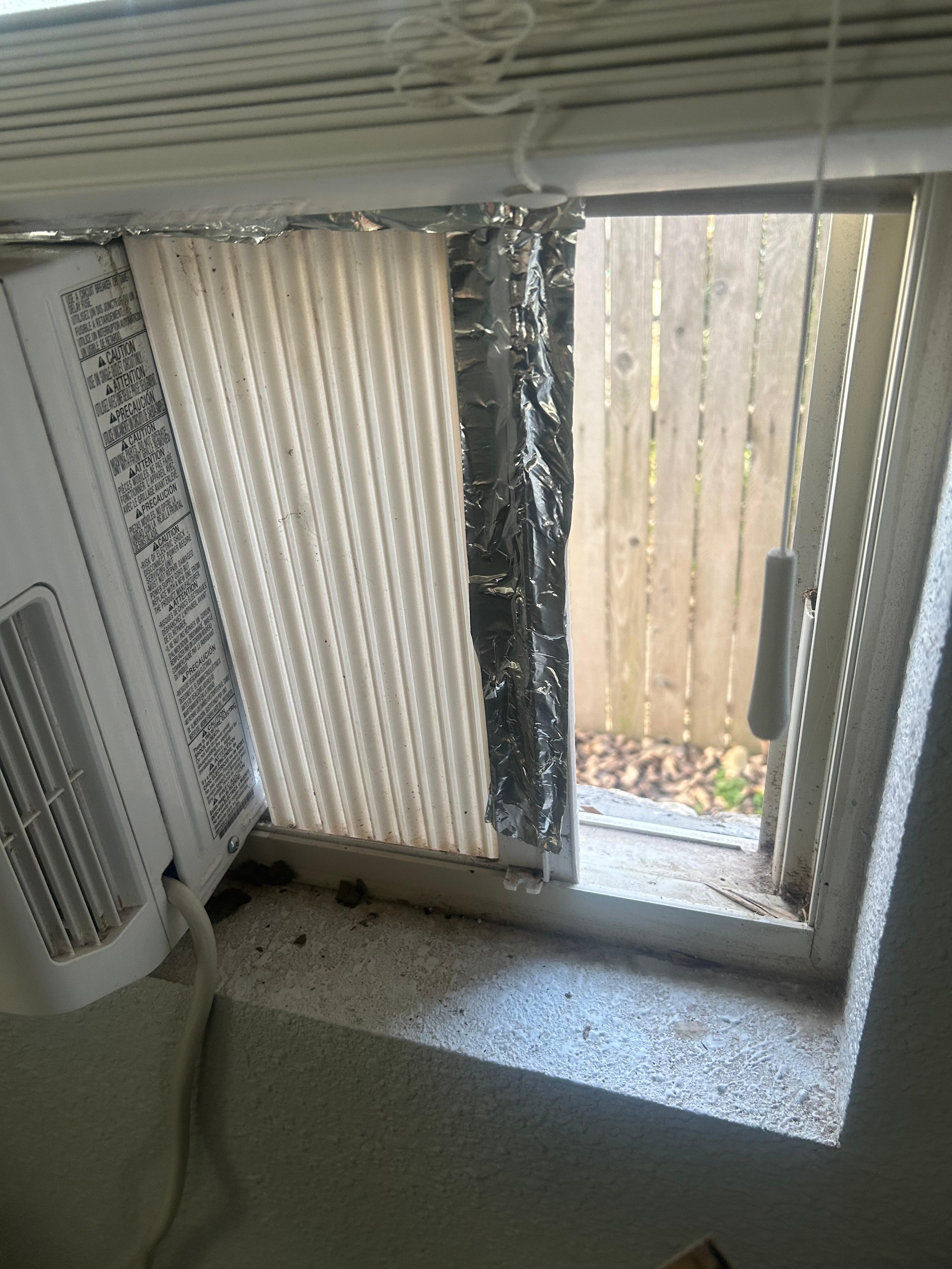 A/c Gap covered with cardboard 