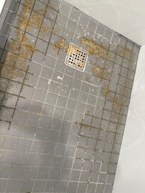unknown grunge on shower floor
