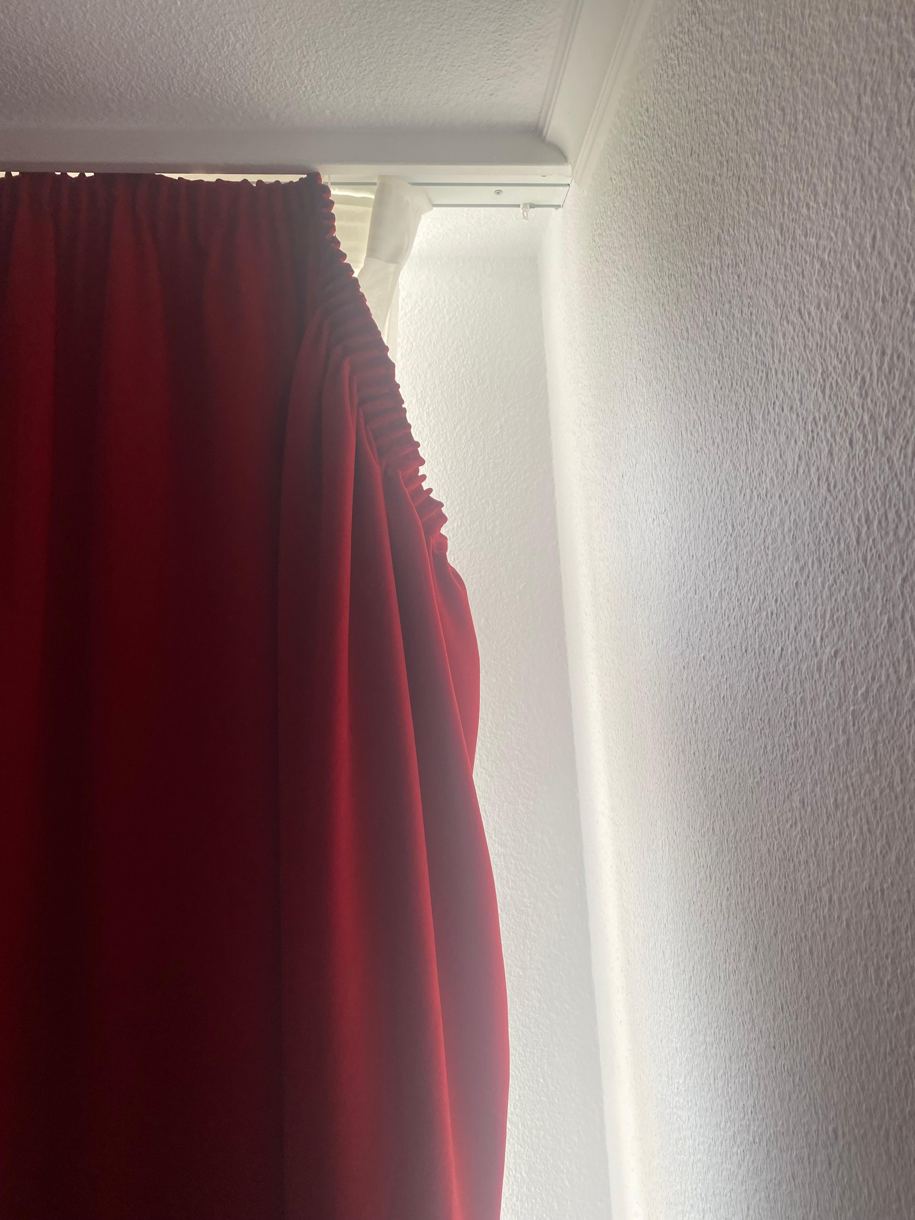 Curtains coming for the rails in the bedroom room