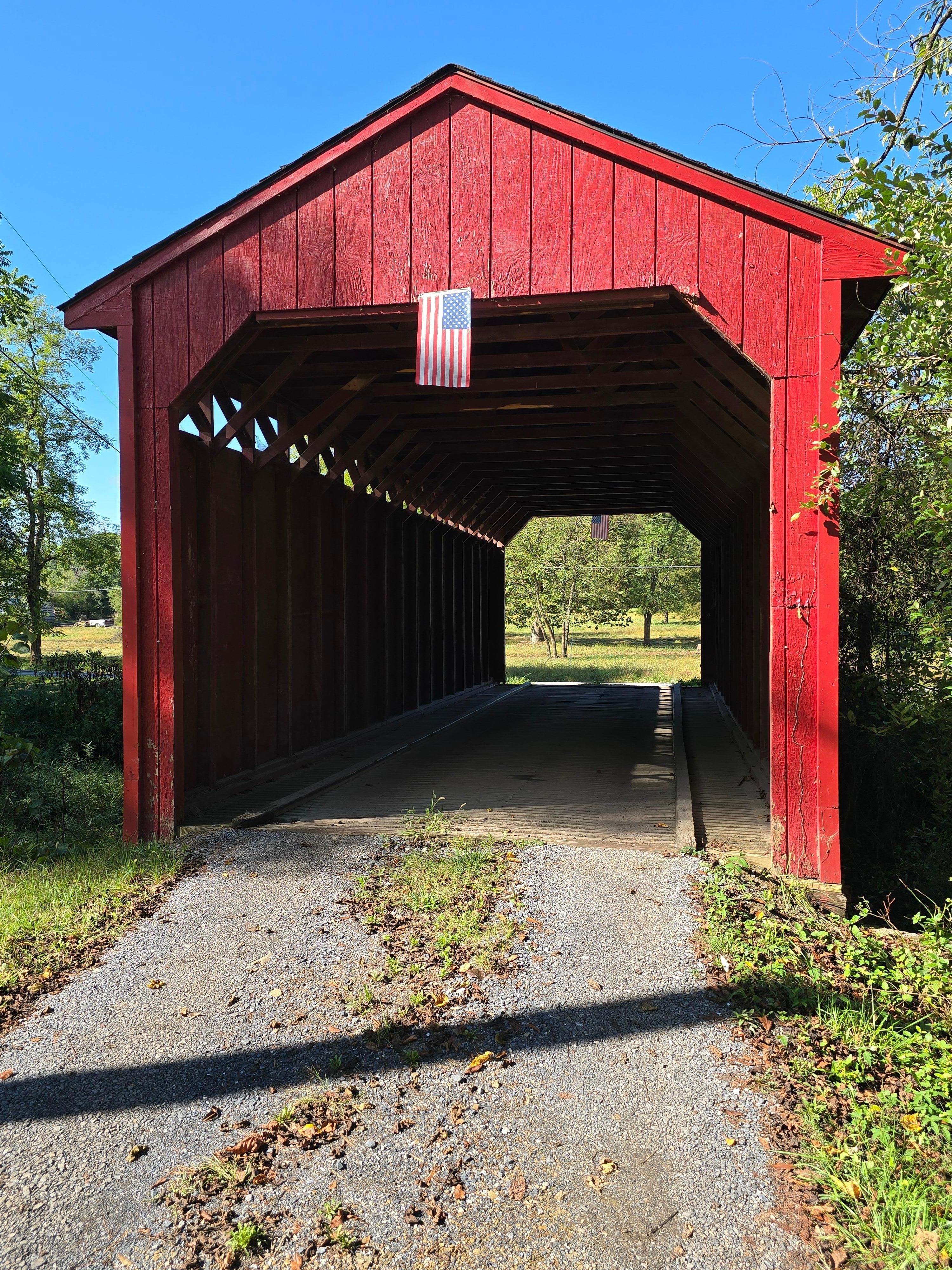 Covered bridge leading to house