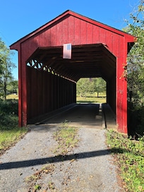 Covered bridge leading to house