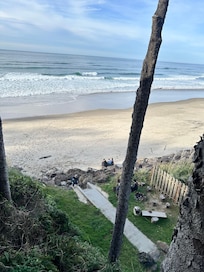 View of the fire pit & beach access from the main floor balcony