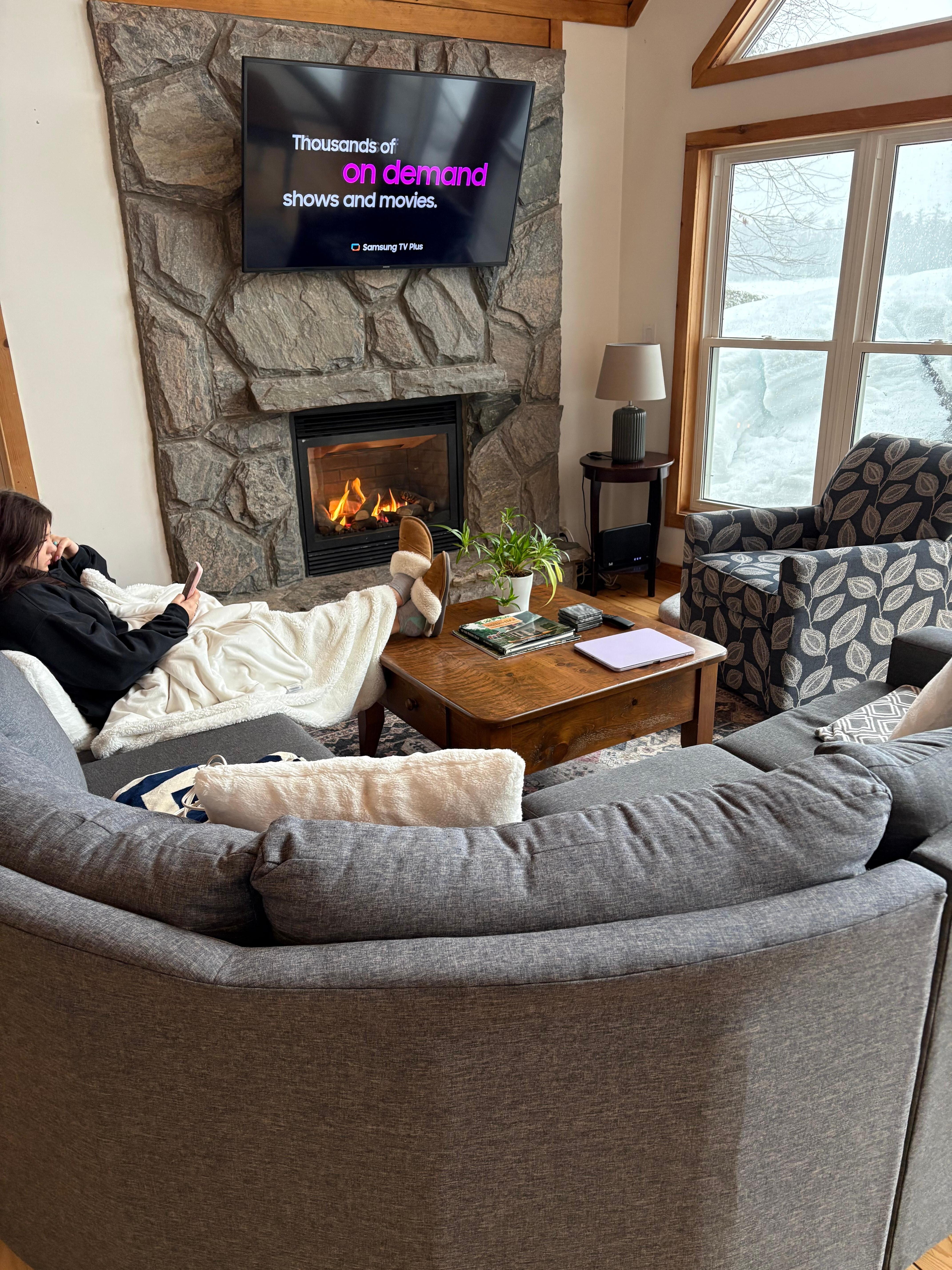 Cuddled up by the fireplace. 