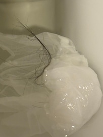 Black Hair in bathtub - I have no hair and my girlfriend has white hair