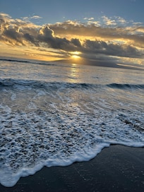 Sunset over the island of Lanai, looking across the Pacific just outside our home for the week.