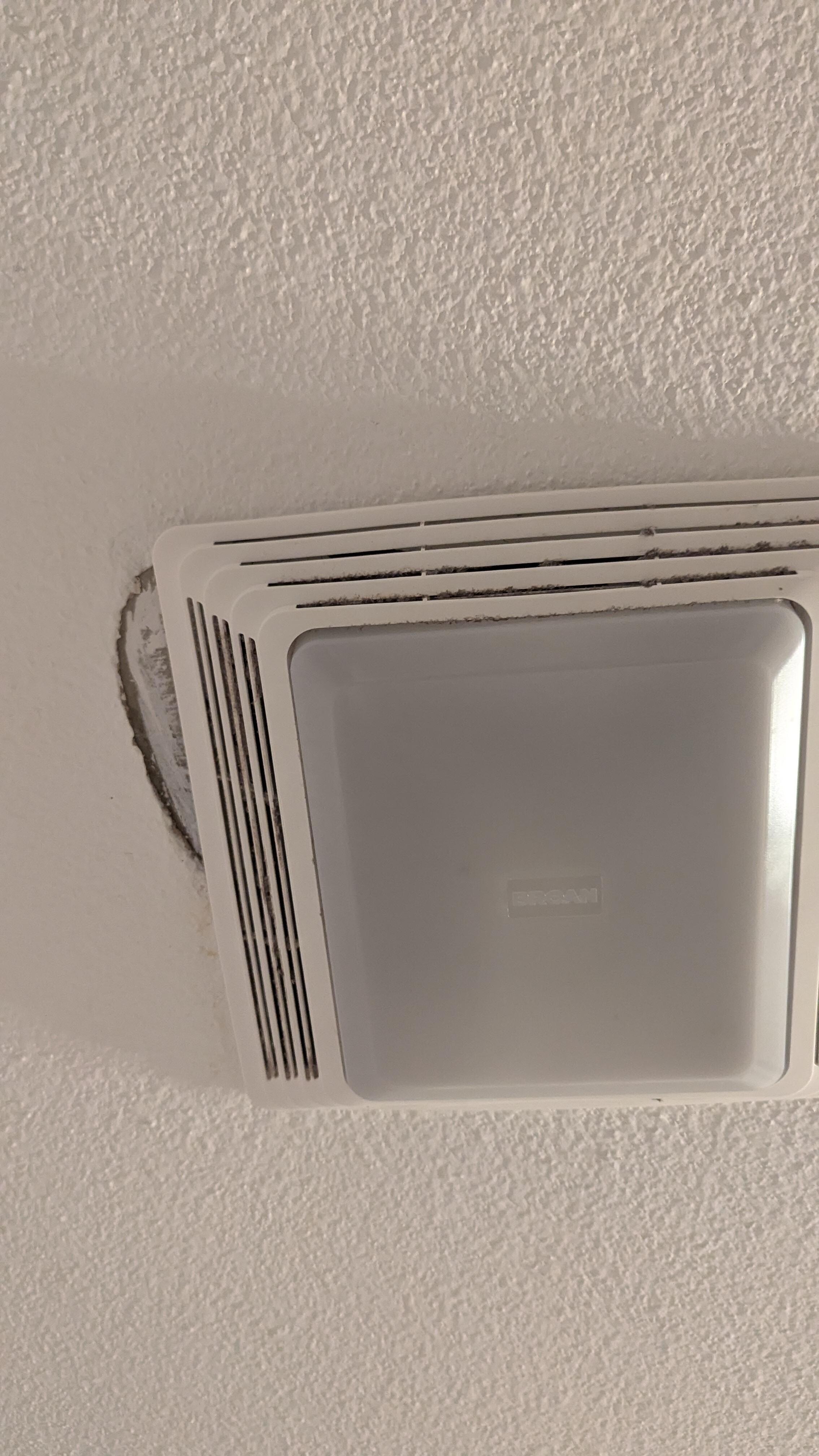 Un-patched ceiling around fixture