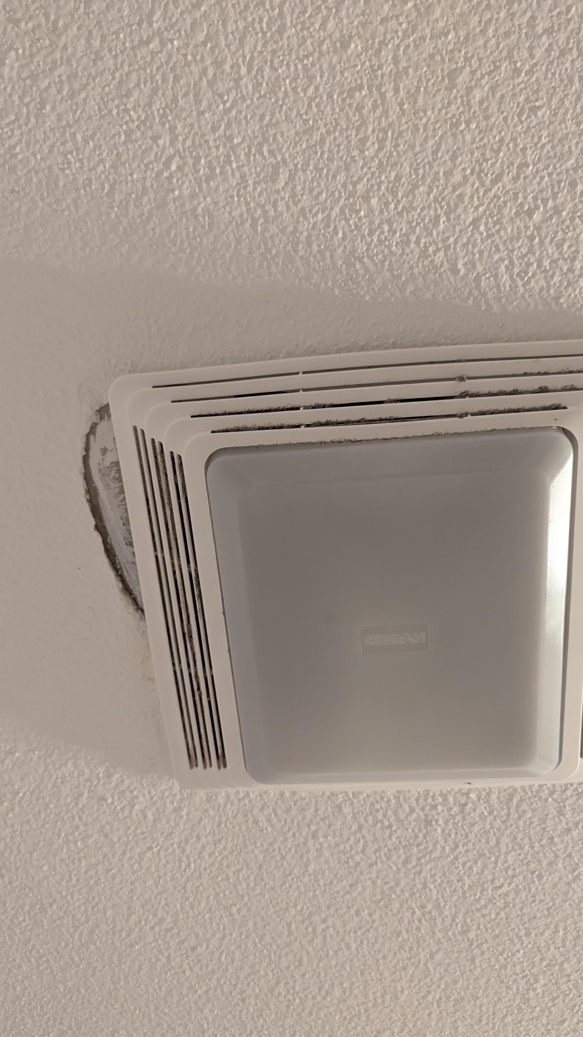 Un-patched ceiling around fixture