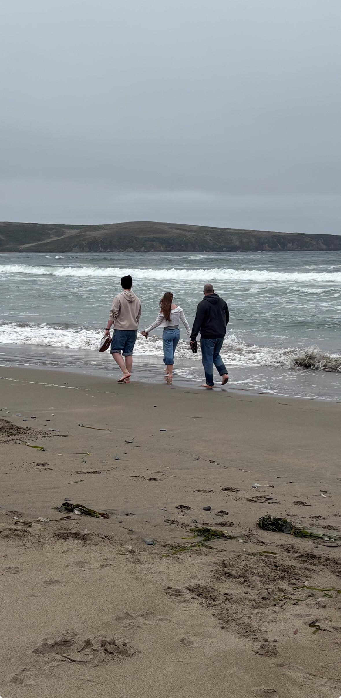 Day 1, family walking on the beach
